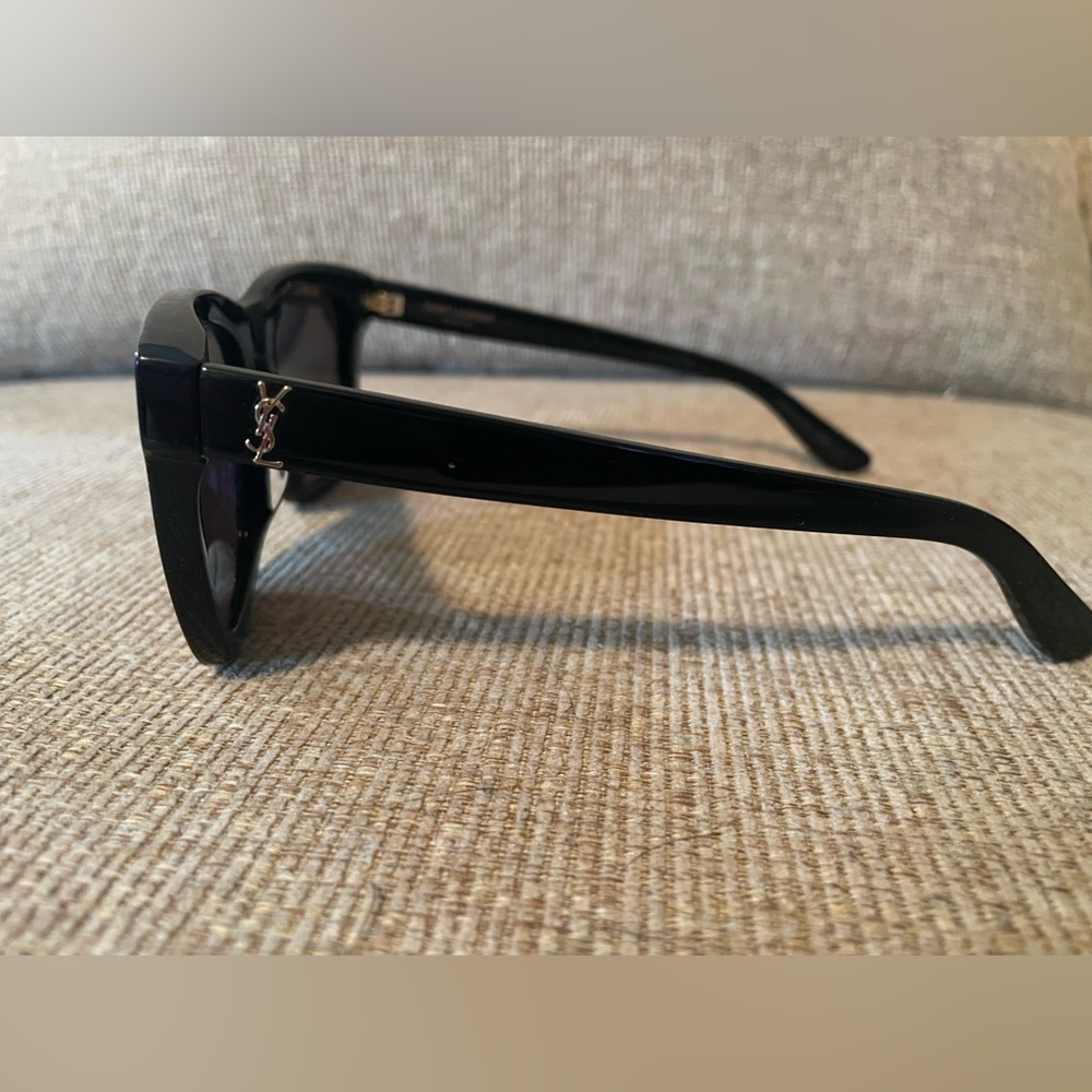 Authentic YSL sunglasses, black with gold lettering.